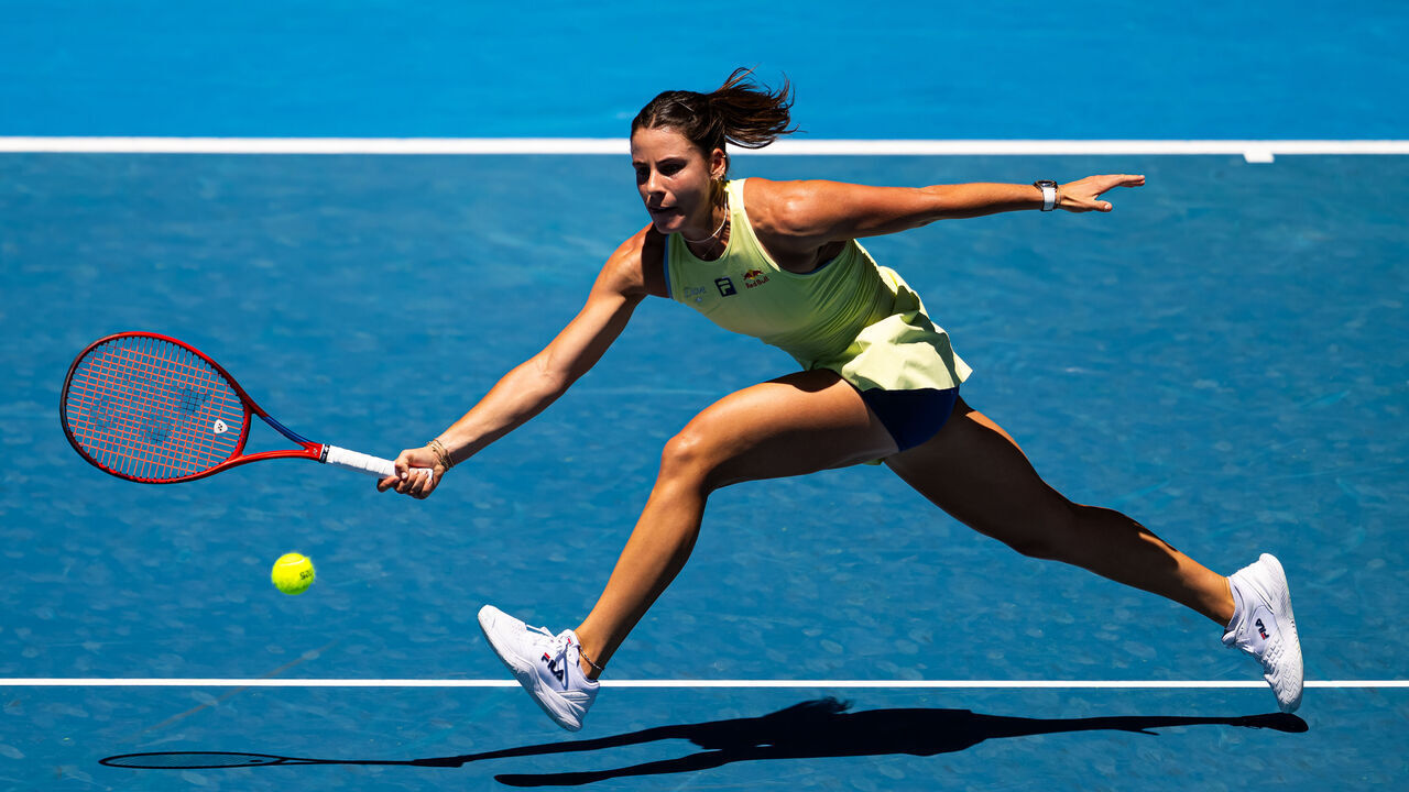 MELBOURNE, AUSTRALIA - JANUARY 14: Emma Navarro of the United States in action against Peyton Stearns of the United States in the women's singles first round on Day 3 of the 2025 Australian Open at Melbourne Park on January 14, 2025 in Melbourne, Australia.