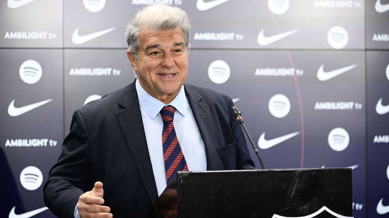 FC Barcelona's President Joan Laporta speaks during a press conference at the Ciudad Deportiva Joan Gamper in Sant Joan Despi, near Barcelona, on January 14, 2025. Dani Olmo's future at Barcelona remains in the balance as the Catalan club pursue their legal battle to get the midfielder registered to play once more. FC Barcelona's failure to meet La Liga's budgetary rules to license both Olmo and forward Pau Victor before the end of last year currently leaves them ineligible to play for the rest of the season.