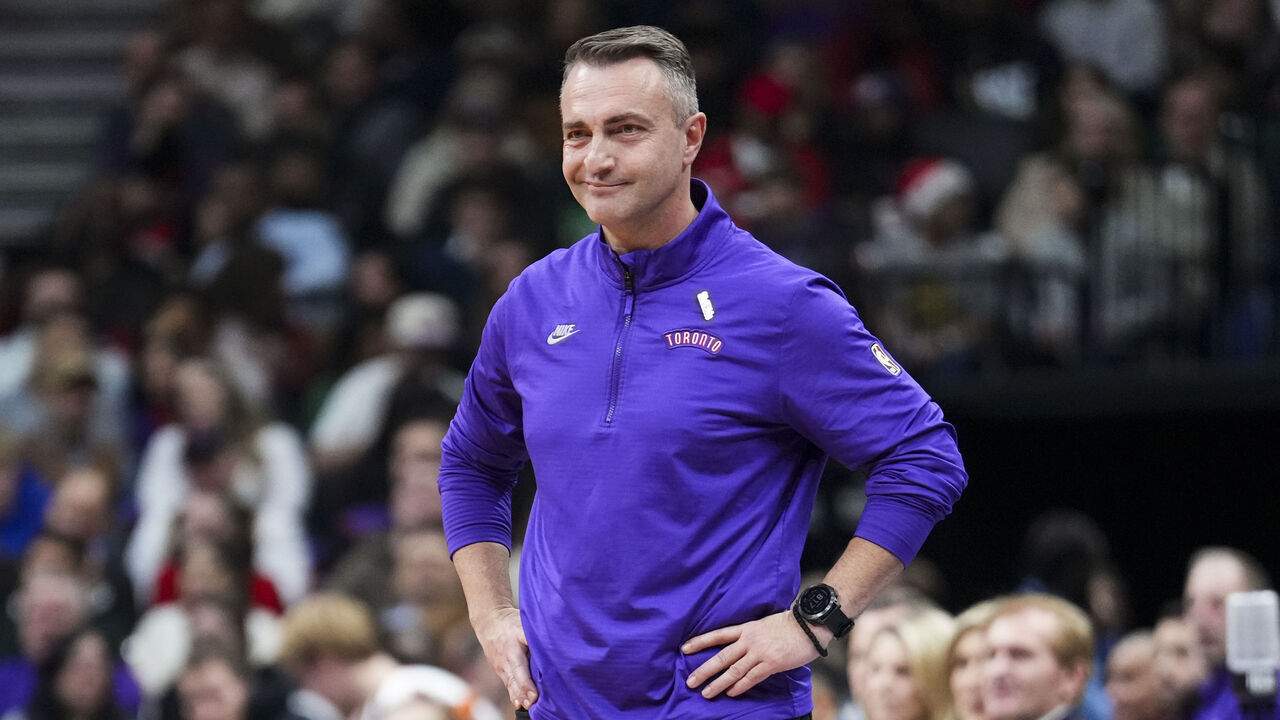 TORONTO, ON - DECEMBER 19: Darko Rajakovic head coach of the Toronto Raptors looks on from the sidelines as his team plays the Brooklyn Nets during the first half of their basketball game at the Scotiabank Arena on December 19, 2024 in Toronto, Ontario, Canada. NOTE TO USER: User expressly acknowledges and agrees that, by downloading and/or using this Photograph, user is consenting to the terms and conditions of the Getty Images License Agreement.