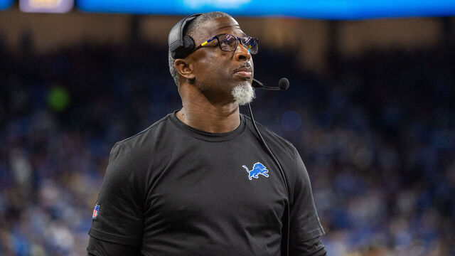 DETROIT, MICHIGAN - DECEMBER 05: Defensive Coordinator Aaron Glenn of the Detroit Lions looks on during the second quarter of a NFL game against the Green Bay Packers at Ford Field on December 05, 2024 in Detroit, Michigan. The Detroit Lions won the game 34-31.