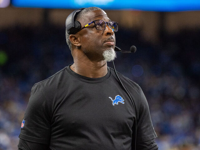 DETROIT, MICHIGAN - DECEMBER 05: Defensive Coordinator Aaron Glenn of the Detroit Lions looks on during the second quarter of a NFL game against the Green Bay Packers at Ford Field on December 05, 2024 in Detroit, Michigan. The Detroit Lions won the game 34-31.