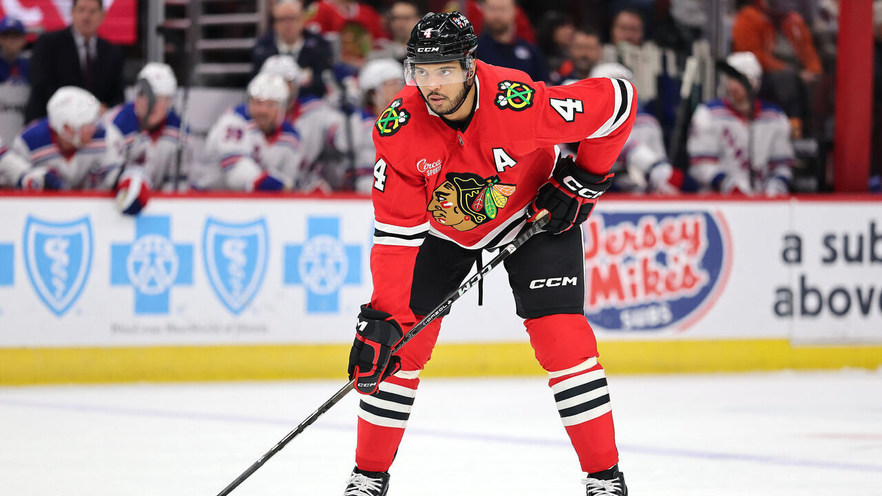 CHICAGO, ILLINOIS - JANUARY 05: Seth Jones #4 of the Chicago Blackhawks looks on against the New York Rangers during the first period at the United Center on January 05, 2025 in Chicago, Illinois.
