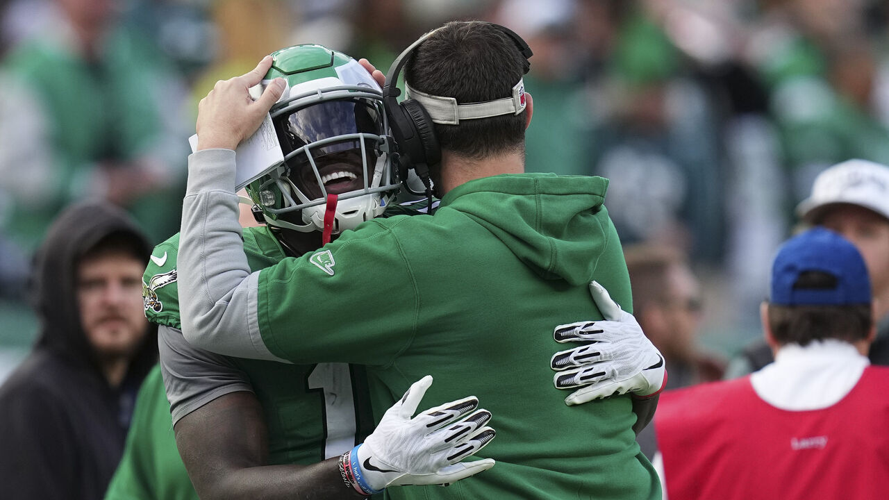 PHILADELPHIA, PENNSYLVANIA - DECEMBER 29: A.J. Brown #11 of the Philadelphia Eagles hugs head coach Nick Sirianni against the Dallas Cowboys at Lincoln Financial Field on December 29, 2024 in Philadelphia, Pennsylvania.