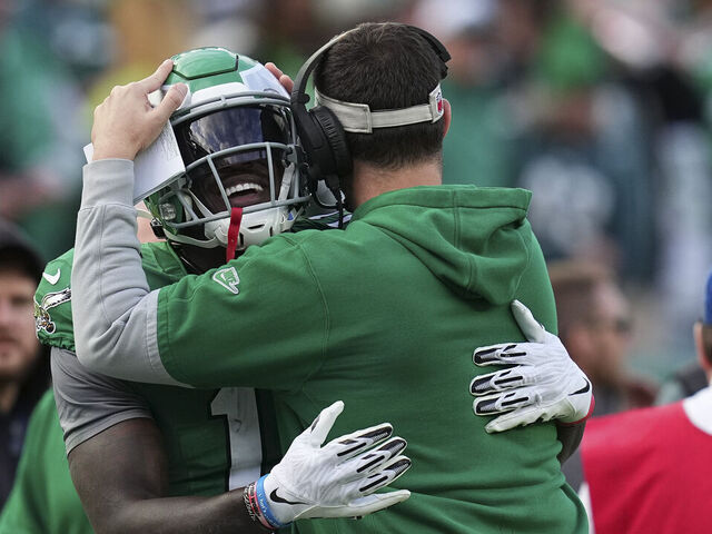 PHILADELPHIA, PENNSYLVANIA - DECEMBER 29: A.J. Brown #11 of the Philadelphia Eagles hugs head coach Nick Sirianni against the Dallas Cowboys at Lincoln Financial Field on December 29, 2024 in Philadelphia, Pennsylvania.