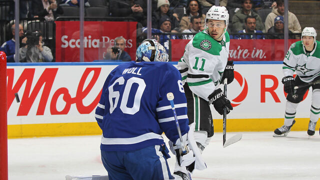 TORONTO, CANADA - JANUARY 14: Logan Stankoven #11 of the Dallas Stars tips a puck past Joseph Woll #60 of the Toronto Maple Leafs during the third period in an NHL game at Scotiabank Arena on January 14, 2025 in Toronto, Ontario, Canada. The Stars defeated the Maple Leafs 4-1.