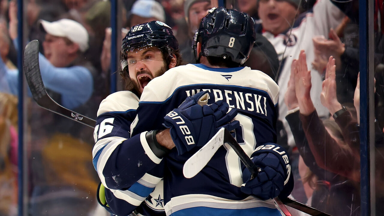COLUMBUS, OHIO - JANUARY 14: Zach Werenski #8 of the Columbus Blue Jackets is congratulated by Kirill Marchenko #86 after scoring the game tying goal during the third period of the game against the Philadelphia Flyers at Nationwide Arena on January 14, 2025 in Columbus, Ohio. Columbus defeated Philadelphia 3-2 in a shootout.