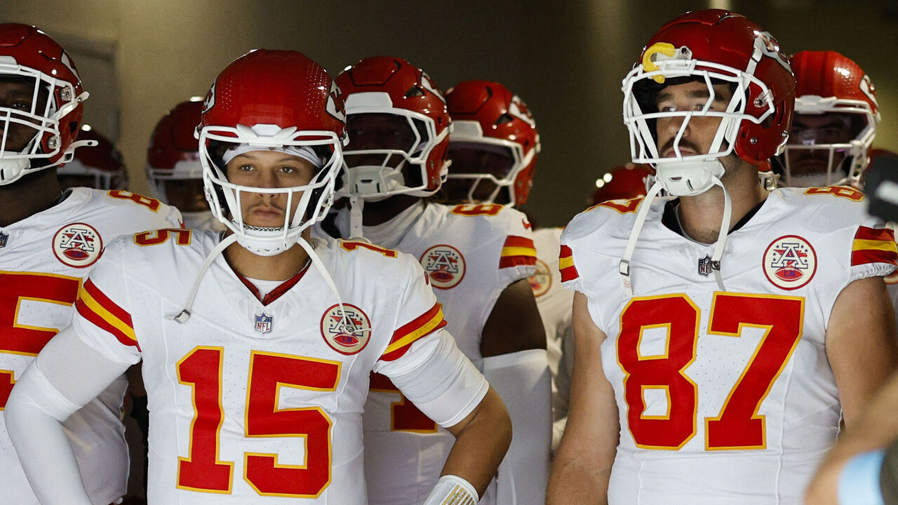 INGLEWOOD, CALIFORNIA - SEPTEMBER 29: Patrick Mahomes #15 and Travis Kelce #87 of the Kansas City Chiefs prepare to take the field with teammates prior to a game against the Los Angeles Chargers at SoFi Stadium on September 29, 2024 in Inglewood, California.