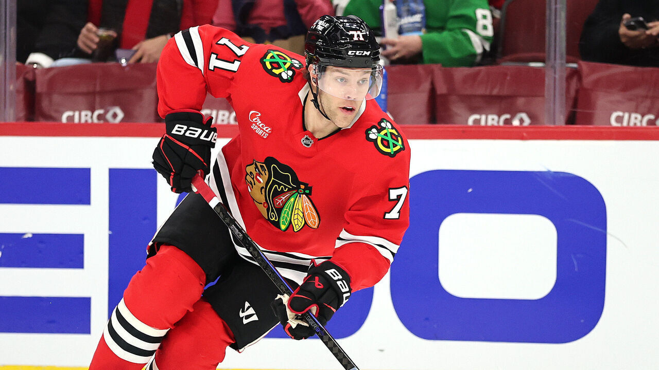 CHICAGO, ILLINOIS - JANUARY 11: Taylor Hall #71 of the Chicago Blackhawks skates with the puck against the Edmonton Oilers during the second period at the United Center on January 11, 2025 in Chicago, Illinois.