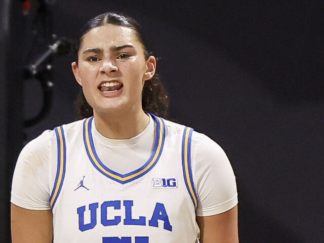 LONG BEACH, CALIFORNIA - JANUARY 15: Lauren Betts #51 of the UCLA Bruins reacts after scoring in the first half against the Penn State Nittany Lions at Walter Pyramid on January 15, 2025 in Long Beach, California.