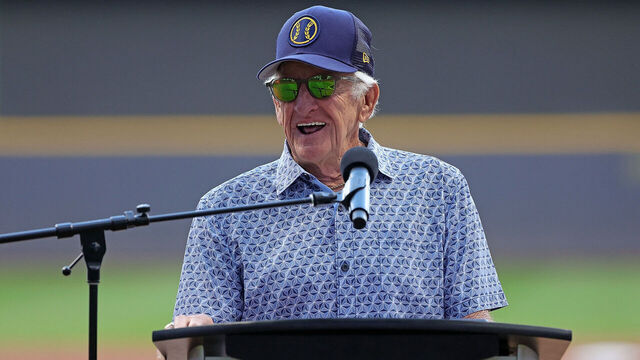 MILWAUKEE, WISCONSIN - AUGUST 05: Broadcaster Bob Uecker speaks to the crowd prior to a game between the Milwaukee Brewers and the Cincinnati Reds at American Family Field on August 05, 2022 in Milwaukee, Wisconsin.