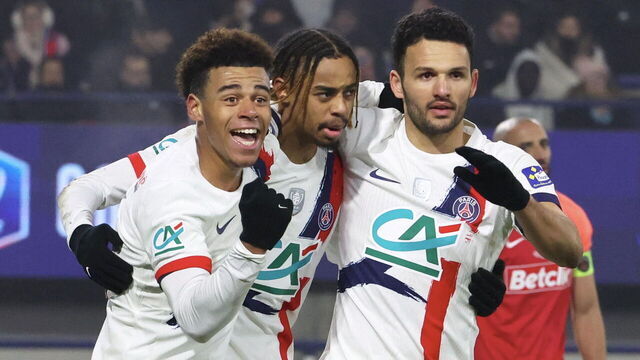 CLERMONT-FERRAND, FRANCE - JANUARY 15: Bradley Barcola (C) of Paris Saint-Germain celebrate his first goal with Goncalo Ramos (R) and Desire Doué during the French Cup - round of 32 match between Espaly FC and Paris Saint-Germain at Stade Marcel Michelin on January 15, 2025 in Clermont-Ferrand, France.