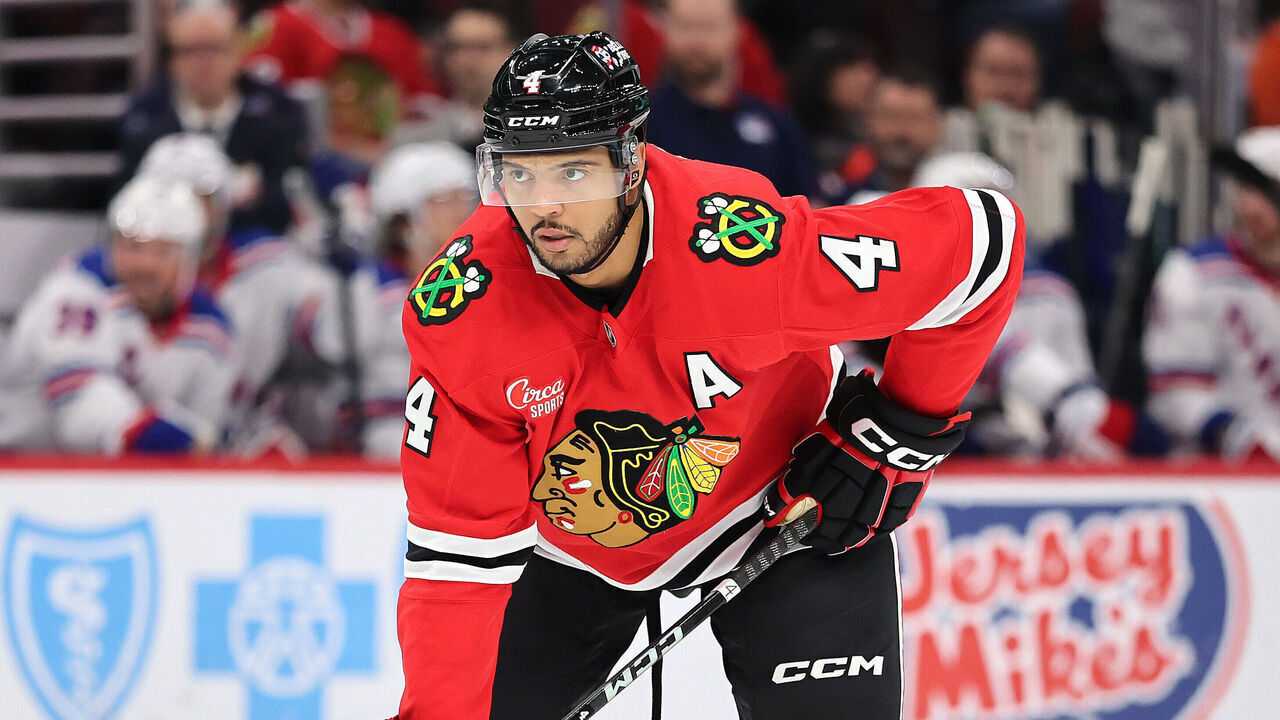 CHICAGO, ILLINOIS - JANUARY 05: Seth Jones #4 of the Chicago Blackhawks looks on against the New York Rangers during the first period at the United Center on January 05, 2025 in Chicago, Illinois.