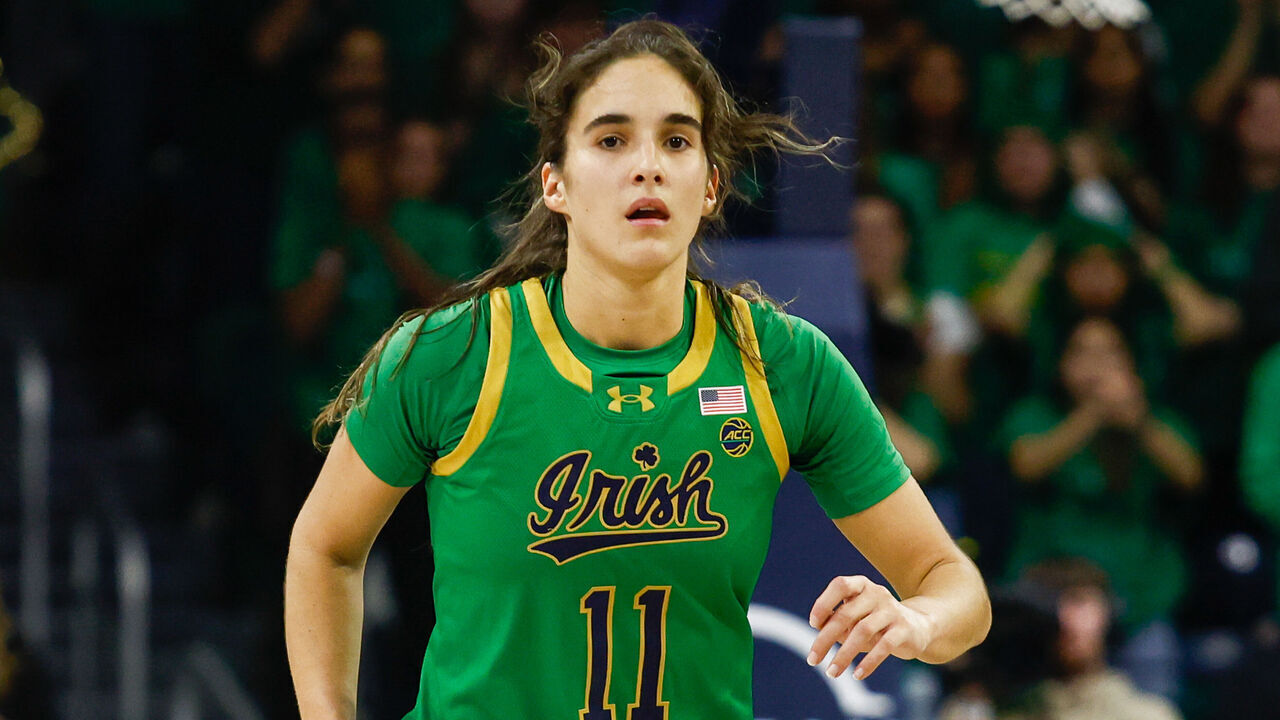 SOUTH BEND, IN - DECEMBER 12: Sonia Citron #11 of Notre Dame runs down the court during a game between Connecticut and Notre Dame at Purcell Pavillion at the Joyce Center on December 12, 2024 in South Bend, Indiana.