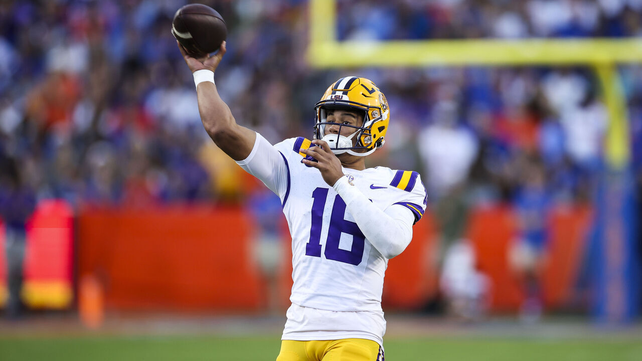 GAINESVILLE, FLORIDA - NOVEMBER 16: Colin Hurley #16 of the LSU Tigers warms up during the 1st half of a game against the Florida Gators at Ben Hill Griffin Stadium on November 16, 2024 in Gainesville, Florida.