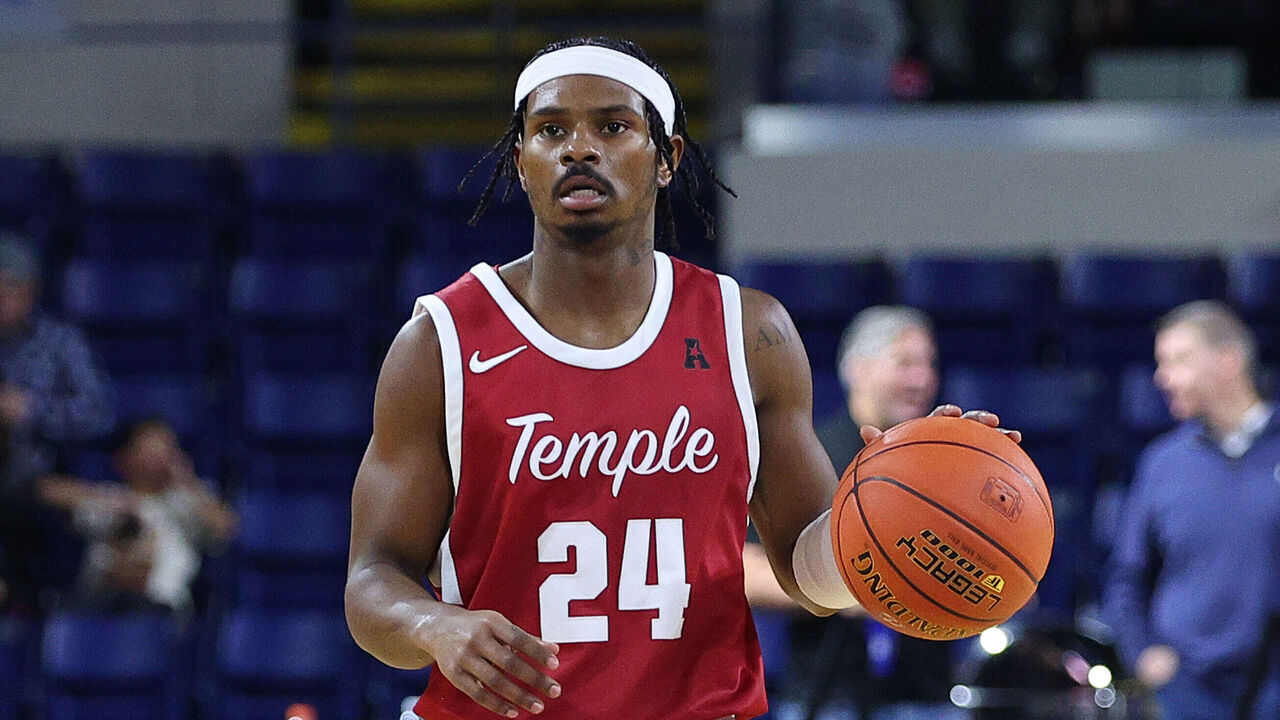 SPRINGFIELD, MA - DECEMBER 21: Temple Owls guard Jamal Mashburn Jr. (24) with the ball during the 2024 college Basketball Hall of Fame Classic game between Temple Owls and Rhode Island Rams on December 21, 2024, at MassMutual Center in Springfield, MA.