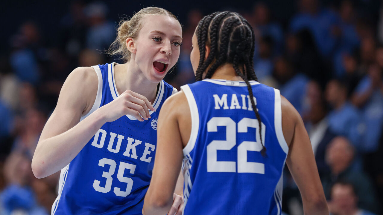 CHAPEL HILL, NC - JANUARY 09: Duke Blue Devils forward Toby Fournier (35) talks to Duke Blue Devils guard Taina Mair (22) during the college basketball game between the North Carolina Tar Heels and the Duke Blue Devils on January 9, 2025 at Carmichael Arena in Chapel Hill, NC.