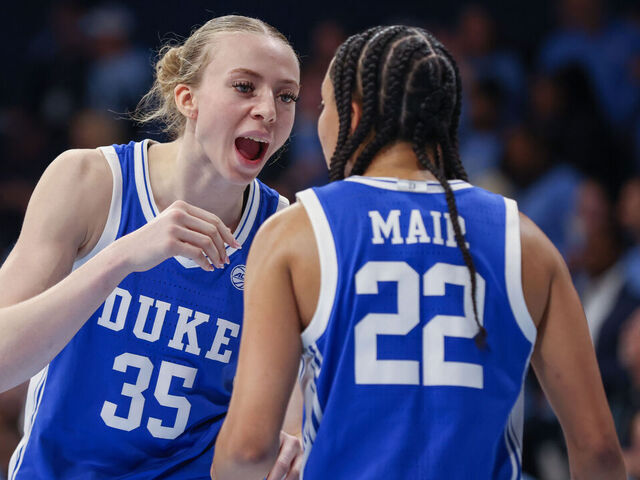 CHAPEL HILL, NC - JANUARY 09: Duke Blue Devils forward Toby Fournier (35) talks to Duke Blue Devils guard Taina Mair (22) during the college basketball game between the North Carolina Tar Heels and the Duke Blue Devils on January 9, 2025 at Carmichael Arena in Chapel Hill, NC.