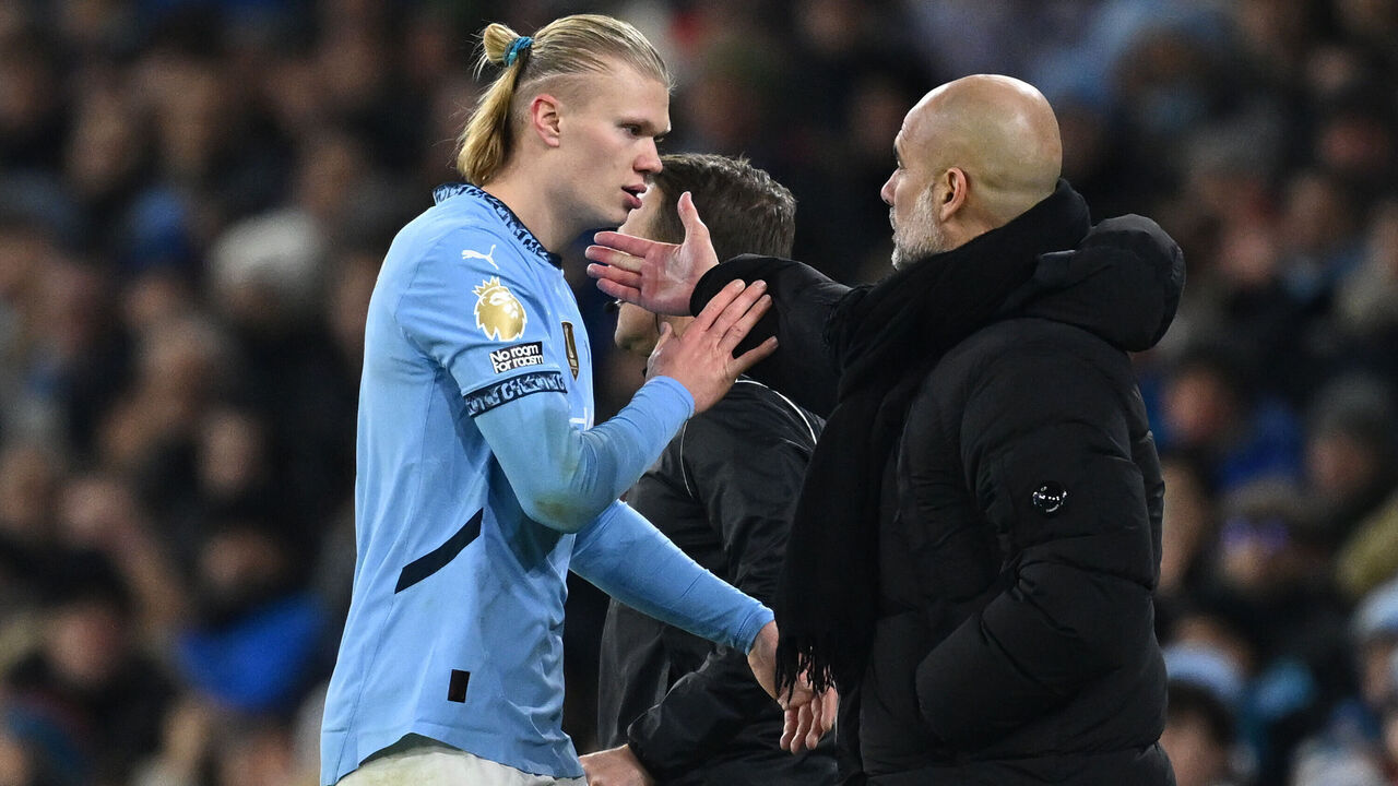MANCHESTER, ENGLAND - JANUARY 04: Erling Haaland is substituted off and embraces Pep Guardiola, Manager of Manchester City, during the Premier League match between Manchester City FC and West Ham United FC at Etihad Stadium on January 04, 2025 in Manchester, England.