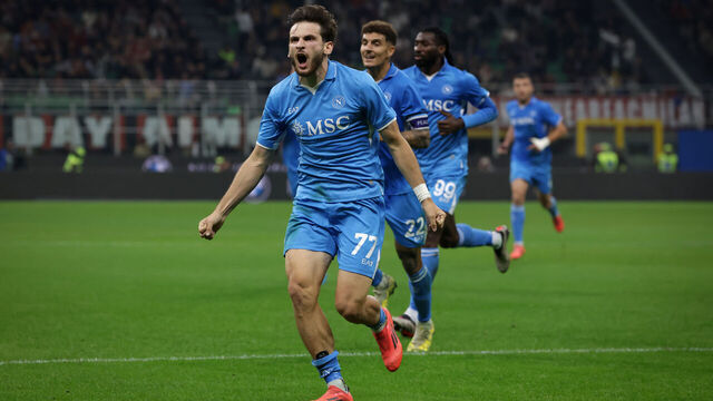 MILAN, ITALY - OCTOBER 29: Khvicha Kvaratskhelia of SSC Napoli celebrates with teammates after scoring to give the side a 2-0 lead during the Serie A match between AC Milan and SSC Napoli at Stadio Giuseppe Meazza on October 29, 2024 in Milan, Italy.
