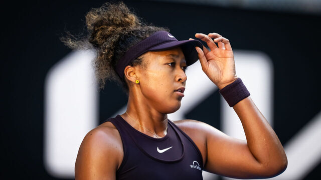 MELBOURNE, AUSTRALIA - JANUARY 17: Naomi Osaka of Japan reacts while playing against Belinda Bencic of Switzerland in the third round on Day 6 of the 2025 Australian Open at Melbourne Park on January 17, 2025 in Melbourne, Australia