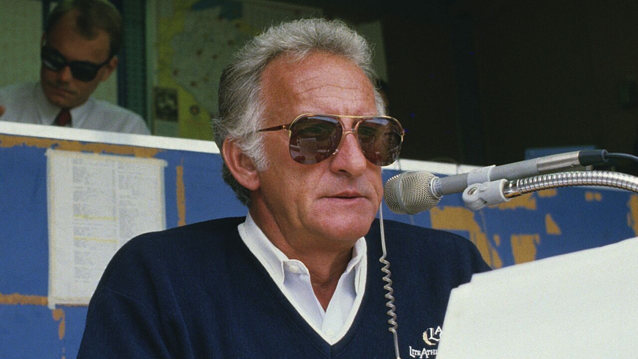 MILWAUKEE, WI - 1980: Broadcaster Bob Uecker of the Milwaukee Brewers in the booth during a game at County Stadium in the 1980s in Milwaukee, Wisconsin.
