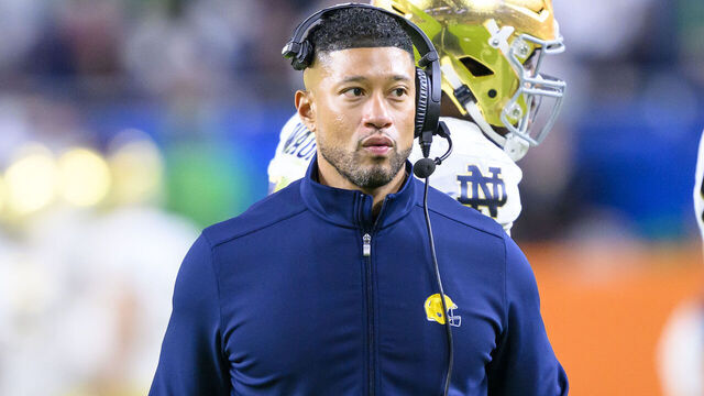 MIAMI GARDENS, FL - JANUARY 09: Head Coach Marcus Freeman of the Notre Dame Fighting Irish watches from the sidelines during the Penn State Nittany Lions versus Notre Dame Fighting Irish College Football Playoff Semifinal at the Capital One Orange Bowl on January 9, 2025, at Hard Rock Stadium in Miami Gardens, FL.