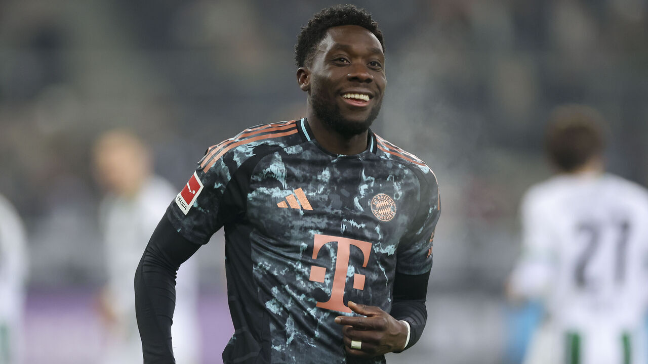 Mönchengladbach, Germany - January 11: Alphonso Davies of Bayern Muenchen smiles during the Bundesliga match between Borussia Mönchengladbach and FC Bayern München at Stadium in Borussia-Park on January 11, 2025 in Mönchengladbach, Germany.