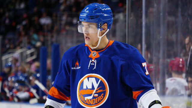 ELMONT, NEW YORK - DECEMBER 07: Maxim Tsyplakov #7 of the New York Islanders in action against the Carolina Hurricanes at UBS Arena on December 07, 2024 in Elmont, New York. New York Islanders defeated the Carolina Hurricanes 4-3.