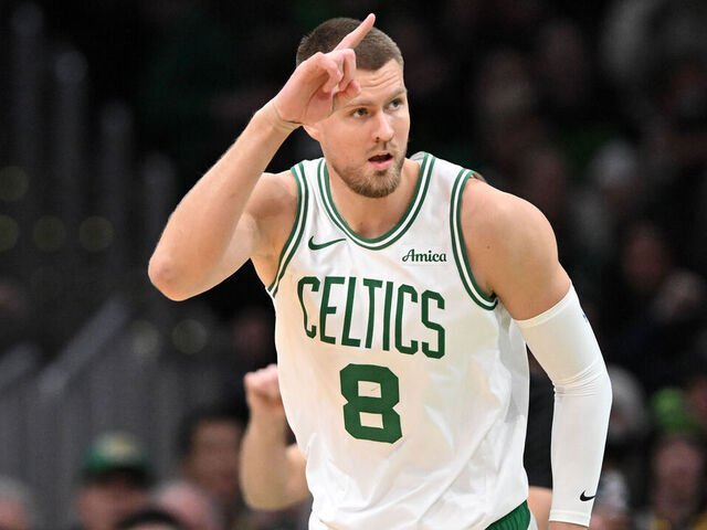 BOSTON, MASSACHUSETTS - JANUARY 17: Kristaps Porzingis #8 of the Boston Celtics reacts after scoring against the Orlando Magic during the first quarter at the TD Garden on January 17, 2025 in Boston, Massachusetts.