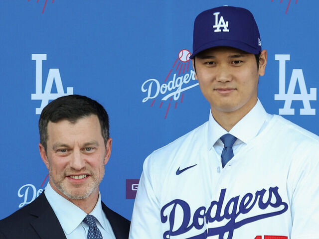 LOS ANGELES, CA - DECEMBER 14: Andrew Friedman and Shohei Ohtani pose for a photo during the Shohei Ohtani Los Angeles Dodgers Press Conference at Dodger Stadium on Thursday, December 14, 2023 in Los Angeles, California.