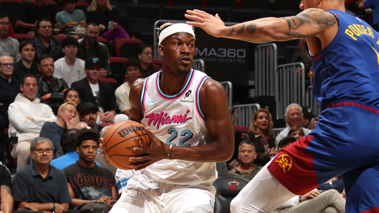 MIAMI, FL - JANUARY 17: Jimmy Butler #22 of the Miami Heat looks to pass the ball during the game against the Denver Nuggets on January 17, 2025 at Kaseya Center in Miami, Florida. Mandatory Copyright Notice: Copyright 2025 NBAE