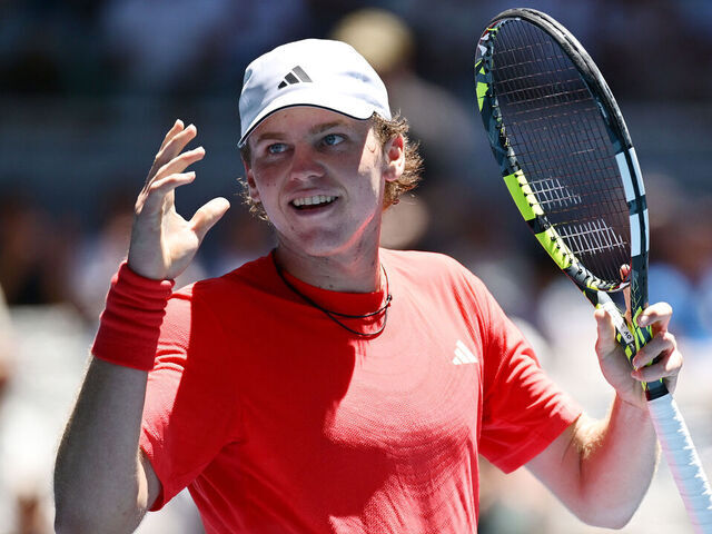 MELBOURNE, AUSTRALIA - JANUARY 18: Alex Michelsen of the United States celebrates winning against Karen Khachanov in the Men's Singles Third Round match during day seven of the 2025 Australian Open at Melbourne Park on January 18, 2025 in Melbourne, Australia.