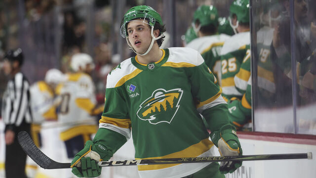 ST PAUL, MINNESOTA - DECEMBER 31: Brock Faber #7 of the Minnesota Wild skates near the bench after his team scored a goal in the third period of a game against the Nashville Predators at Xcel Energy Center on December 15, 2024 in St Paul, Minnesota.