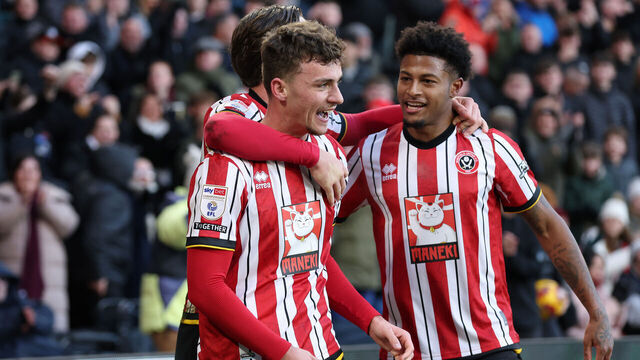 SHEFFIELD, ENGLAND - JANUARY 18: Harrison Burrows of Sheffield United celebrates with Rhian Brewster after scoring their first goal during the Sky Bet Championship match between Sheffield United FC and Norwich City FC at Bramall Lane on January 18, 2025 in Sheffield, England.