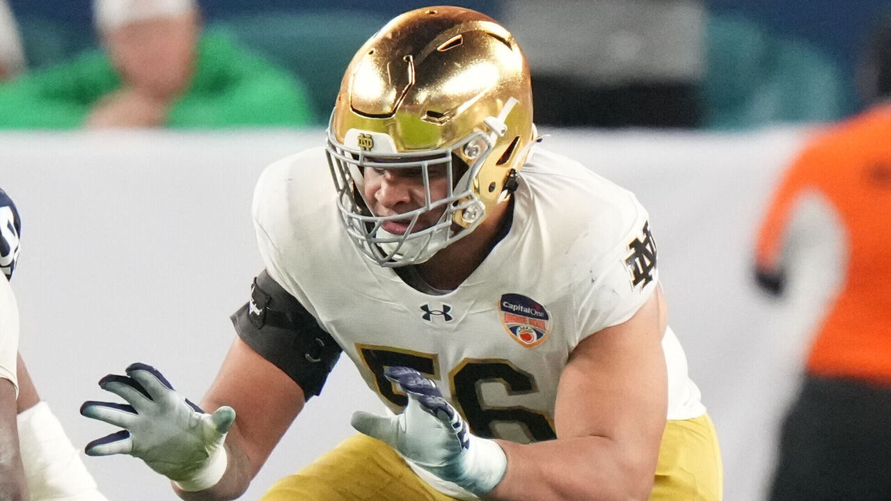 MIAMI GARDENS, FL - JANUARY 09: Notre Dame Fighting Irish offensive lineman Charles Jagusah (56) protects the pocket during the Penn State Nittany Lions versus Notre Dame Fighting Irish College Football Playoff Semifinal at the Capital One Orange Bowl on January 9, 2025, at Hard Rock Stadium in Miami Gardens, FL.