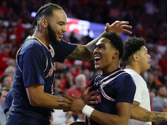 ATHENS, GEORGIA - JANUARY 18: Johni Broome #4 reacts with Tahaad Pettiford #0 of the Auburn Tigers during the second half against the Georgia Bulldogs at Stegeman Coliseum on January 18, 2025 in Athens, Georgia.