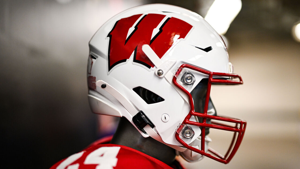 INDIANAPOLIS, IN - JULY 24: The Wisconsin Badgers helmet on display during the 2024 Big Ten Media Days on July 24, 2024 at Lucas Oil Stadium in Indianapolis, IN.