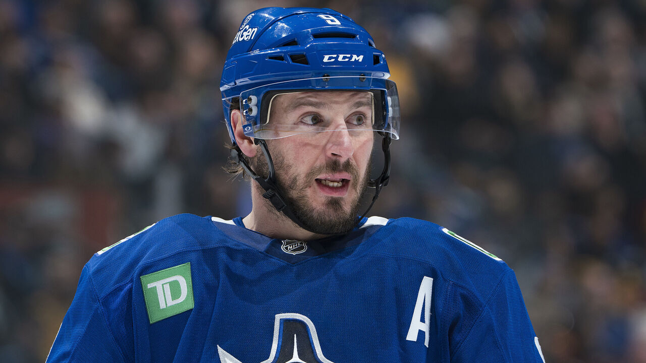 VANCOUVER, CANADA - JANUARY 3: J.T. Miller #9 of the Vancouver Canucks lines up for a face off during their NHL game against the Nashville Predators at Rogers Arena on January 3, 2025 in Vancouver, British Columbia, Canada.