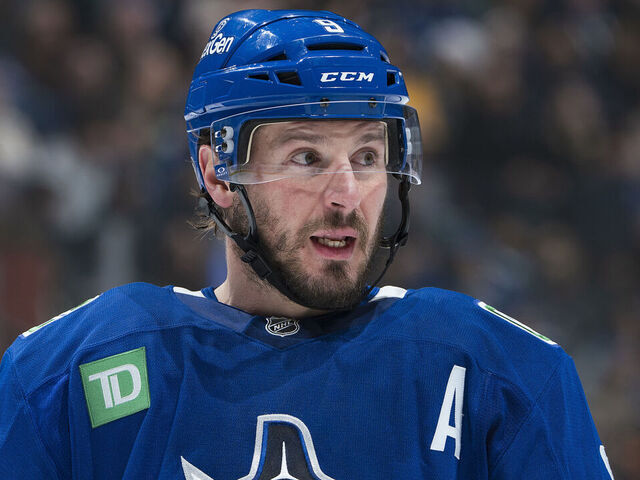 VANCOUVER, CANADA - JANUARY 3: J.T. Miller #9 of the Vancouver Canucks lines up for a face off during their NHL game against the Nashville Predators at Rogers Arena on January 3, 2025 in Vancouver, British Columbia, Canada.