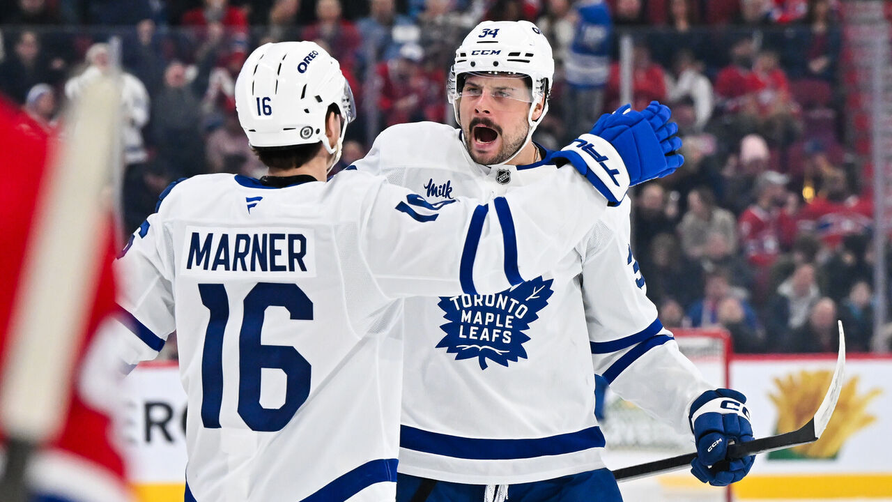 MONTREAL, CANADA - JANUARY 18: Auston Matthews #34 of the Toronto Maple Leafs celebrates his goal with teammate Mitch Marner during the third period against the Montreal Canadiens at the Bell Centre on January 18, 2025 in Montreal, Quebec, Canada. The Toronto Maple Leafs defeated the Montreal Canadiens 7-3.
