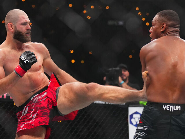 INGLEWOOD, CALIFORNIA - JANUARY 18: (L-R) Jiri Prochazka of the Czech Republic kicks Jamahal Hill in a light heavyweight fight during the UFC 311 event at Intuit Dome on January 18, 2025 in Inglewood, California.