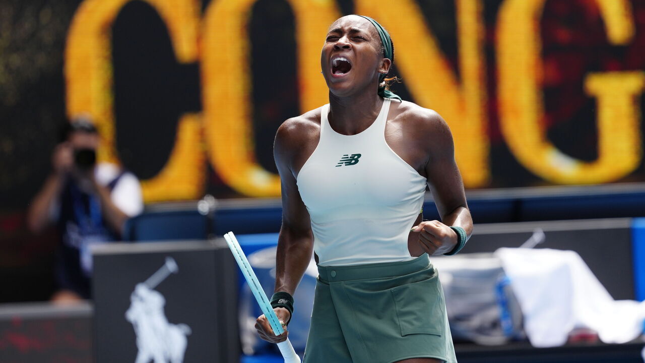 MELBOURNE, AUSTRALIA - JANUARY 19: Coco Gauff of the United States celebrates winning the match point against Belinda Bencic of Switzerland in the Women's Singles Fourth Round match during day eight of the 2025 Australian Open at Melbourne Park on January 19, 2025 in Melbourne, Australia.