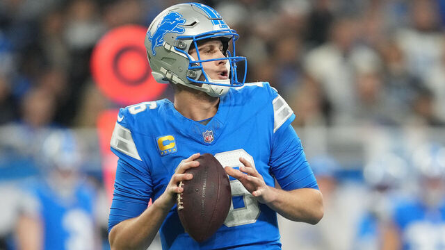 DETROIT, MICHIGAN - JANUARY 18: Jared Goff #16 of the Detroit Lions looks to throw the ball during the second quarter against the Washington Commanders in the NFC Divisional Playoff at Ford Field on January 18, 2025 in Detroit, Michigan.