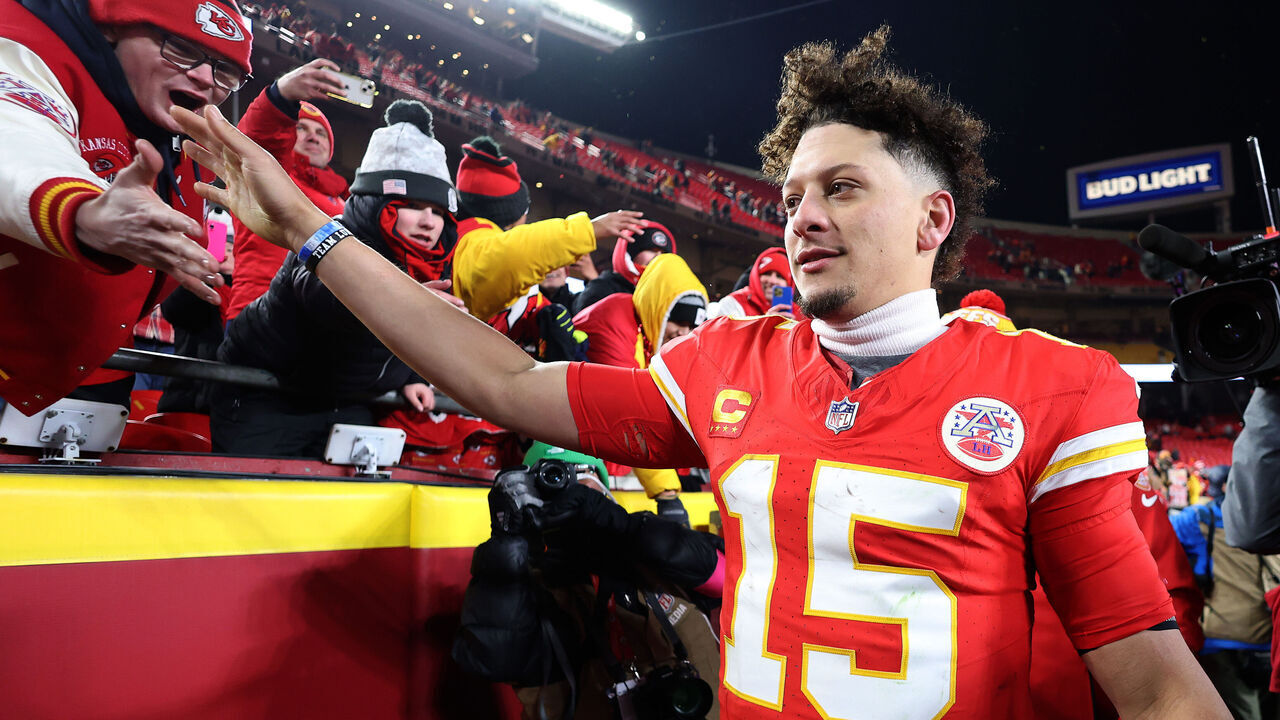 KANSAS CITY, MISSOURI - JANUARY 18: Patrick Mahomes #15 of the Kansas City Chiefs celebrates with fans after defeating the Houston Texans in the AFC Divisional Playoff at GEHA Field at Arrowhead Stadium on January 18, 2025 in Kansas City, Missouri.