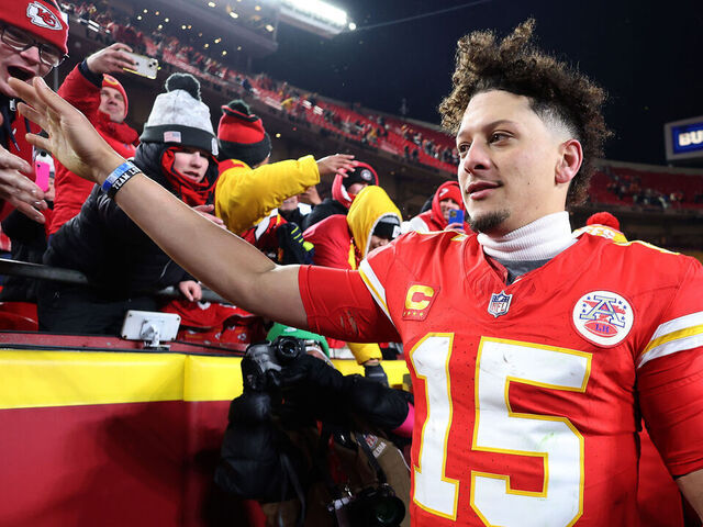 KANSAS CITY, MISSOURI - JANUARY 18: Patrick Mahomes #15 of the Kansas City Chiefs celebrates with fans after defeating the Houston Texans in the AFC Divisional Playoff at GEHA Field at Arrowhead Stadium on January 18, 2025 in Kansas City, Missouri.