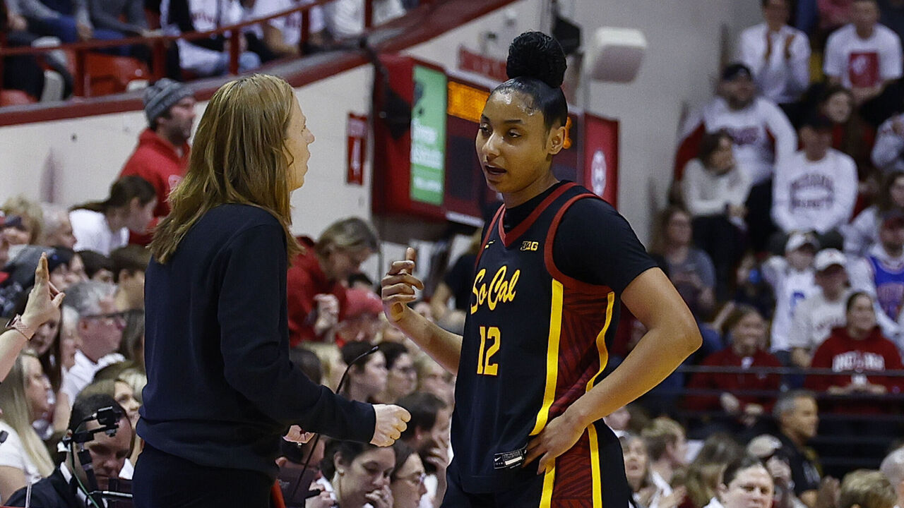 BLOOMINGTON, IN - JANUARY 19: USC Trojans guard JuJu Watkins (12) talks with USC Trojans head coach Lindsay Gottlieb during a women's college basketball game between the USC Trojans and the Indiana Hoosiers on January 19, 2025 at Simon Skjodt Assembly Hall in Bloomington IN.