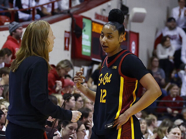 BLOOMINGTON, IN - JANUARY 19: USC Trojans guard JuJu Watkins (12) talks with USC Trojans head coach Lindsay Gottlieb during a women's college basketball game between the USC Trojans and the Indiana Hoosiers on January 19, 2025 at Simon Skjodt Assembly Hall in Bloomington IN.