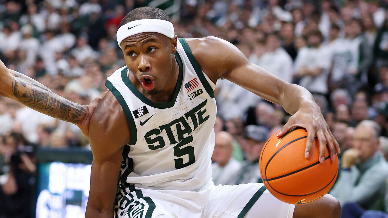 EAST LANSING, MICHIGAN - JANUARY 15: Tre Holloman #5 of the Michigan State Spartans plays against the Penn State Nittany Lions at the Breslin Center on January 15, 2025 in East Lansing, Michigan.