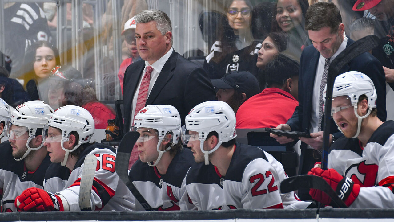 LOS ANGELES, CA - JANUARY 1: New Jersey Devils Sheldon Keefe looks on from the bench during the second period against the Los Angeles Kings at Crypto.com Arena on January 1, 2025 in Los Angeles, California.