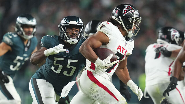 PHILADELPHIA, PENNSYLVANIA - SEPTEMBER 16: Brandon Graham #55 of the Philadelphia Eagles attempts to tackle Bijan Robinson #7 of the Atlanta Falcons at Lincoln Financial Field on September 16, 2024 in Philadelphia, Pennsylvania.